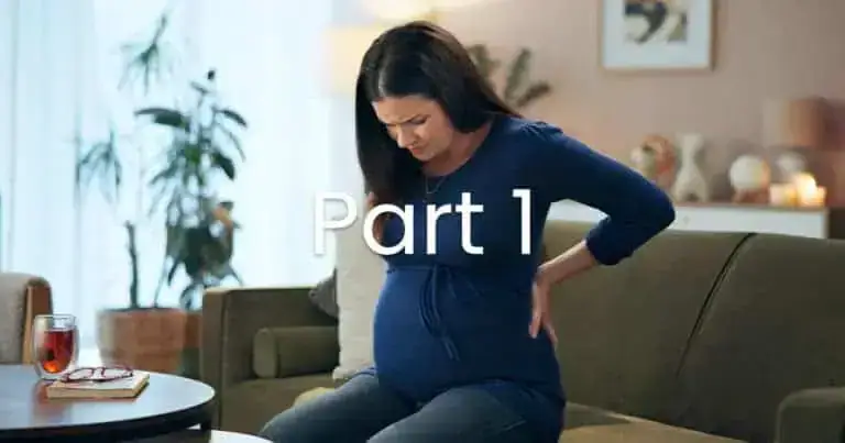 Pregnant woman experiencing back pain, seeking relief during pregnancy.